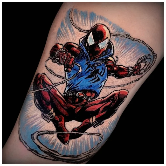 Scarlet Spider tattoo in red and blue, with a web surrounding the figure.